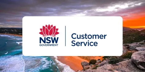 NSW Government Department of Customer Service logo with coastal background